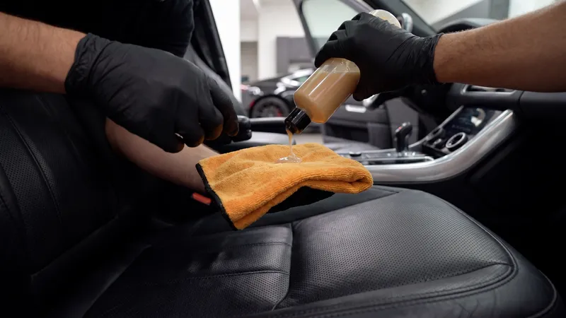 Leather being conditioned by hand